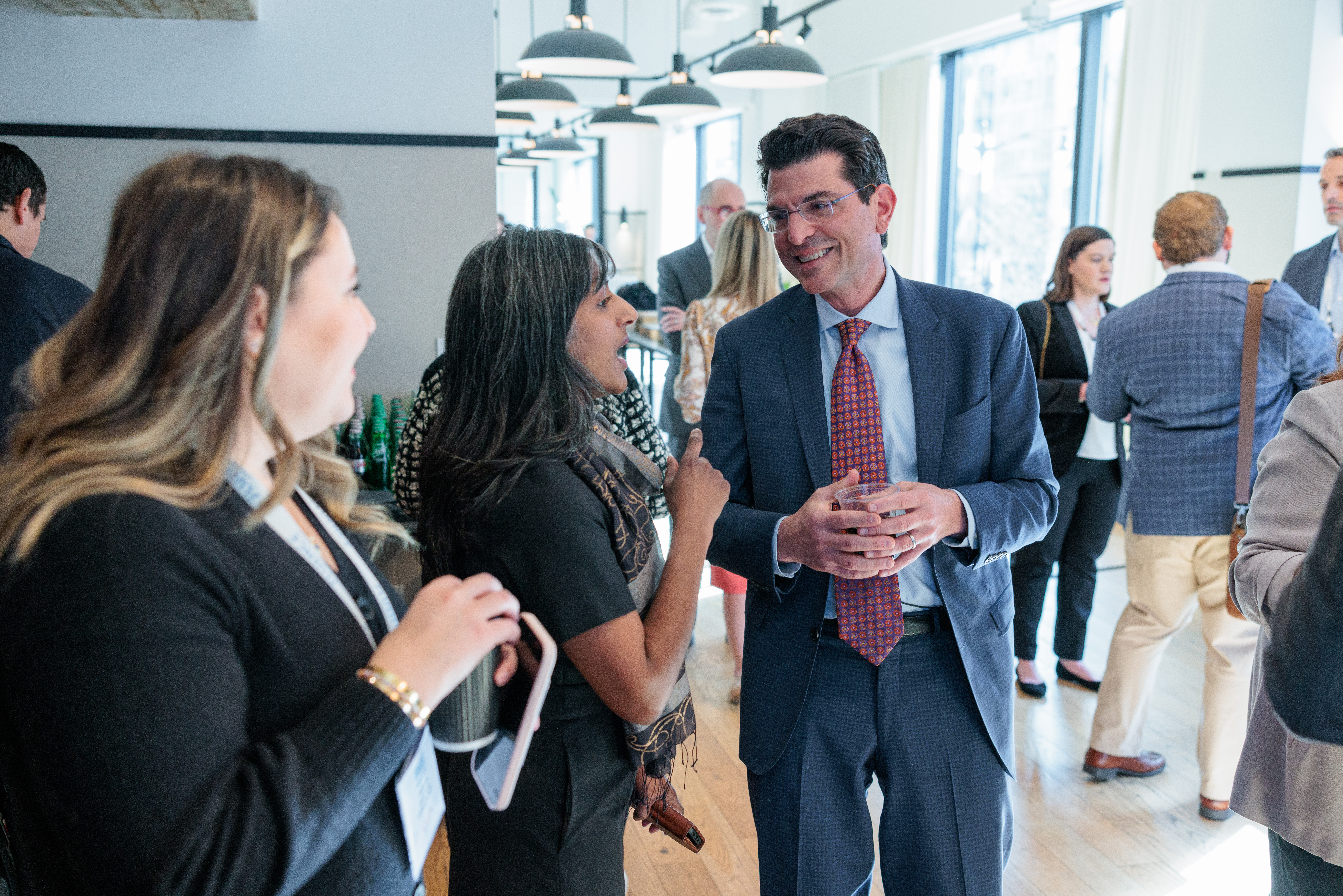 ACP CEO Jason Grumet Converses with Conference Attendees.