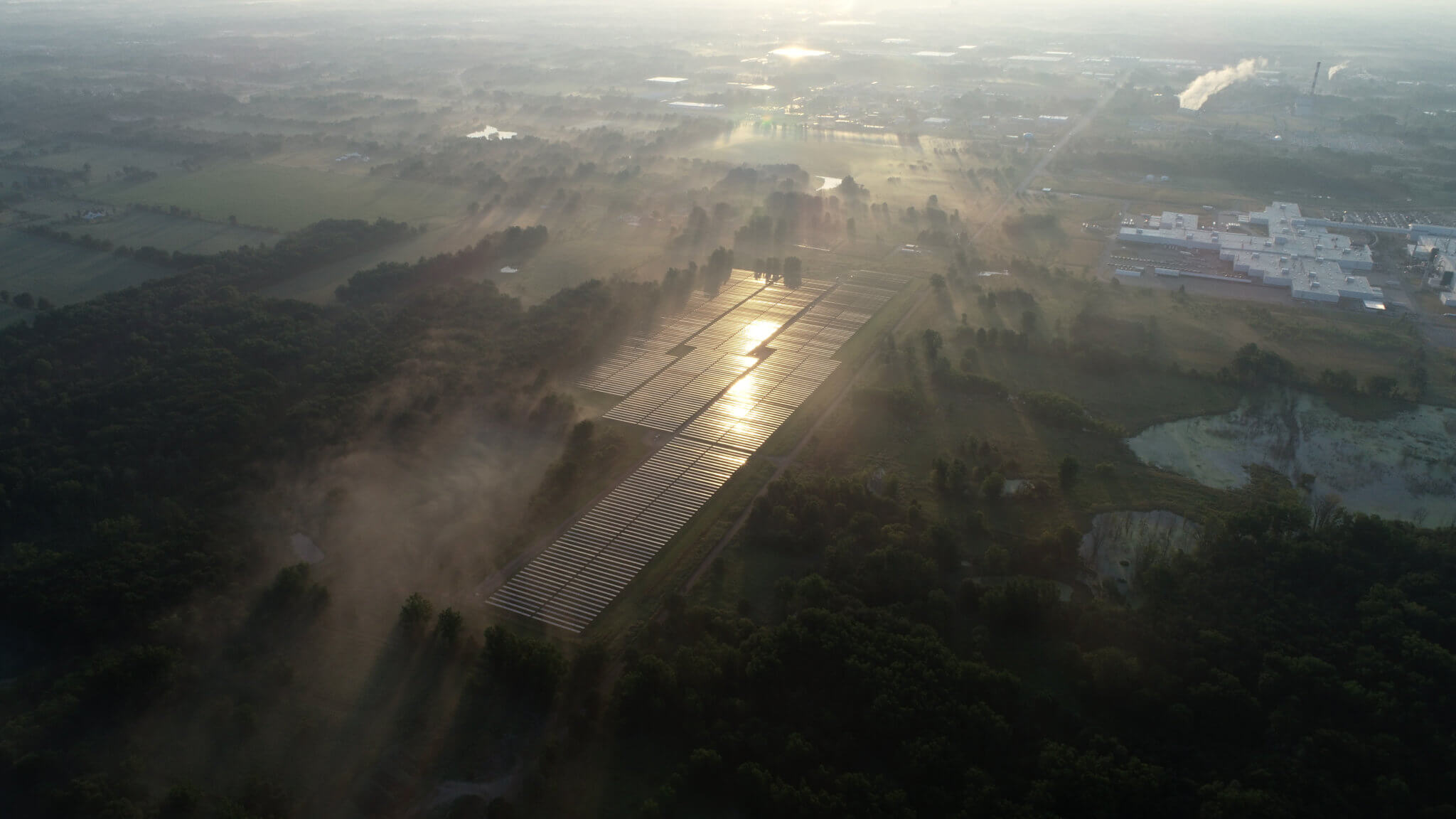 An aerial view of a utility-scale solar farm and storage facility in the United States.