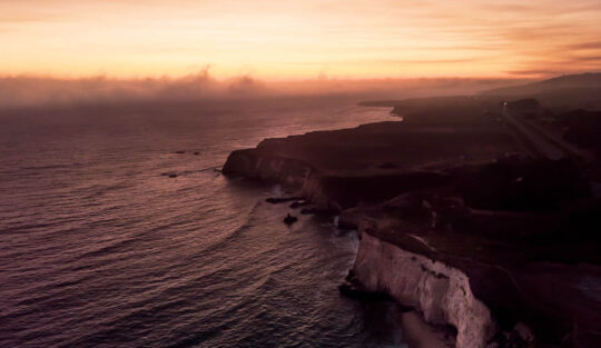 The wind blows across a wind turbine’s blades