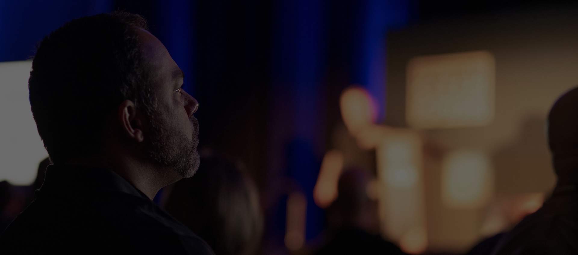 Man looking at OMS presentation