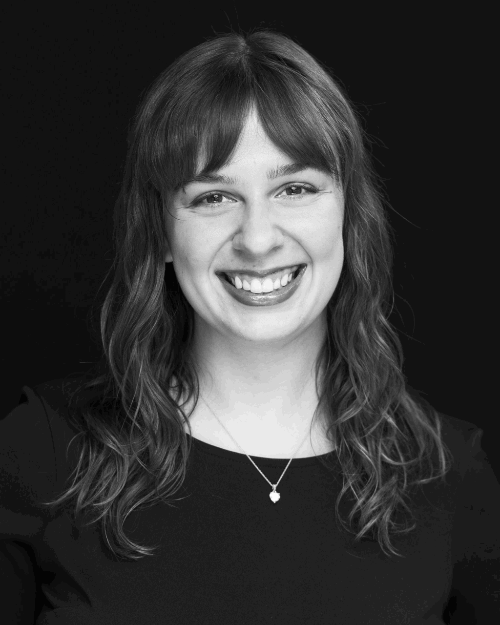 black and white headshot of madelyn smerillo